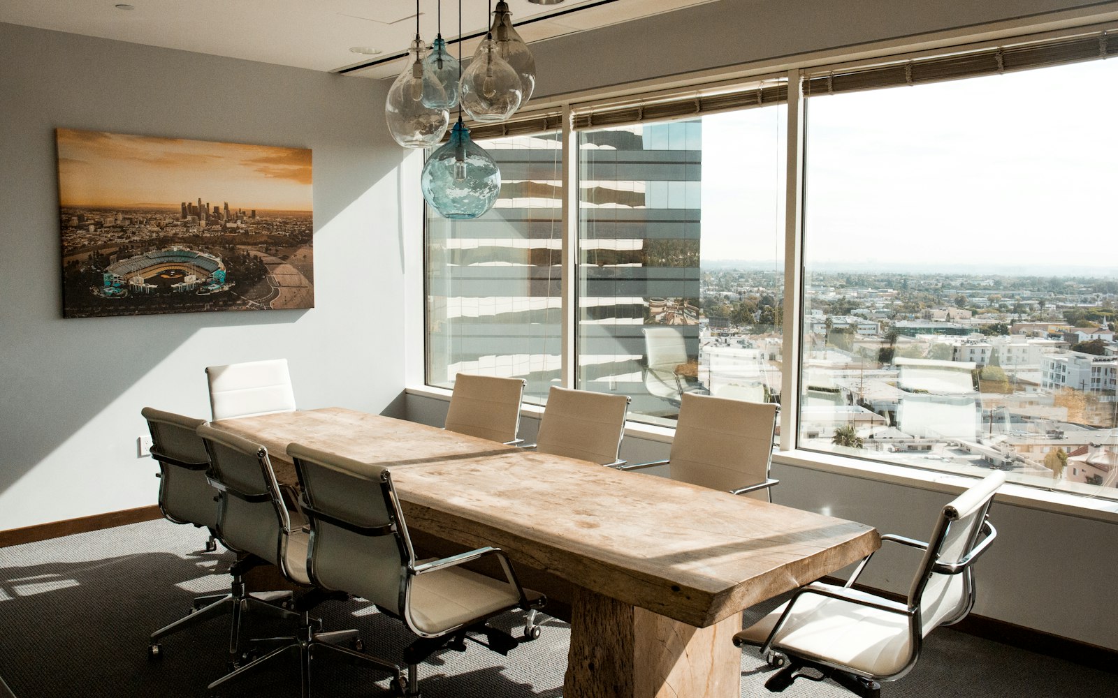 A refined executive boardroom in muted light